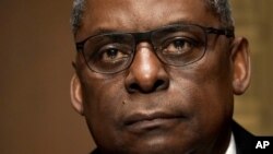 Secretary of Defense nominee Lloyd Austin, a recently retired Army general, attends his conformation hearing before the Senate Armed Services Committee on Capitol Hill, Tuesday, Jan. 19, 2021, in Washington. (Greg Nash/Pool via AP)