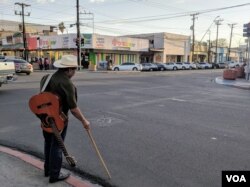Some migrants have been in Mexicali, Mexico for weeks, due to not having the financial means to make their way across the border, after making the harrowing trip from their native countries in search for a better life in the United States. (Photo: R. Taylor / VOA)