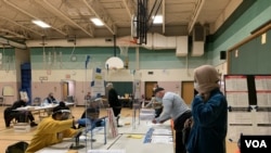 កម្រង​រូបភាព៖ ពលរដ្ឋ​អាមេរិក​បោះឆ្នោត​ជ្រើសរើស​ប្រធានាធិបតី​ថ្មី ក្នុង​អំឡុងពេល​មាន​ការ​រាតត្បាត​ជំងឺ​កូវីដ១៩