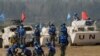 Latihan militer Penjaga Perdamaian PBB "Shared Destiny 2021" di pangkalan pelatihan Operasi Penjaga Perdamaian Queshan di Kabupaten Queshan, provinsi Henan, China tengah, Rabu, 15 September 2021. (AP Photo/Ng Han Guan)