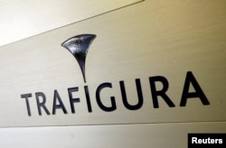 FILE - The Trafigura logo is pictured in the company entrance in Geneva, Switzerland, March 11, 2012.