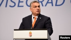 FILE - Prime Minister of Hungary Viktor Orban attends a news conference in Budapest, Hungary, June 21, 2018.