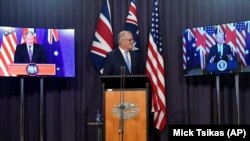 Australijski premijer Scott Morrison tokom video sastanka sa britanskim premijerom i predskednikom SAD.