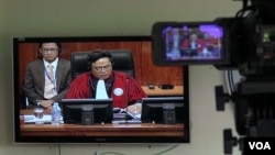 លោកចៅក្រម និល​ ណុន ​​ប្រធាន​​អង្គ​ជំនុំជម្រះ​​សាលា​ដំបូង​​កាត់ទោស​​មេ​ដឹកនាំ​ខ្មែរក្រហម​​