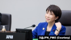 资料照片：日本首相高市早苗在2025年10月31日举行的亚太经合组织领导人会议第一次会议上。