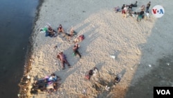 Migrantes descansan en su ruta a Estados Unidos. [Foto Eugenia Sagastume/VOA].