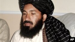 Người phụ nữ la hét kêu gọi phóng thích những nữ sinh Nigeria bị bắt cóc ở ngôi làng hẻo lánh Chibok, trong buổi thắp nến cầu nguyện tại Abuja.