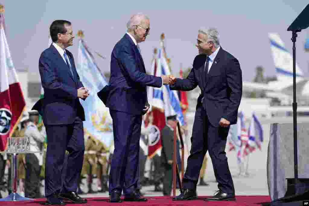 استقبال اسحاق هرتزوگ و یائیر لاپید، رئیس جمهوری و نخست وزیر اسرائیل، از رئیس جمهوری ایالات متحده (چهارشنبه ۲۲ تیر ۱۴۰۱)