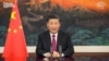 This video grab taken Jan. 25, 2021, from the website of the World Economic Forum shows China's President Xi Jinping speaking from Beijing as he addresses an all-virtual World Economic Forum, which usually takes place in Davos, Switzerland.