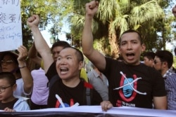 បាតុករ​វៀតណាម​ស្រែក​ពាក្យ​ស្លោក​ប្រឆាំង​ចិន​នៅ​ក្នុង​ក្រុង​ហាណូយ ប្រទេស​វៀតណាម កាលពី​ថ្ងៃទី១៩ ខែមិថុនា ឆ្នាំ២០១៤។