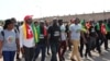 Plusieurs Togolais ont marché à l'appel du Front citoyen Togo debout pour exiger la libération des détenus politiques, à Lomé, 5 octobre 2018. (VOA/Kayi Lawson)