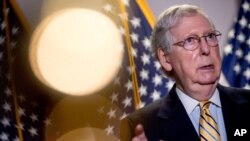 FILE - Senate Majority Leader Mitch McConnell, a Republican, speaks to reporters on Capitol Hill, June 16, 2020. 