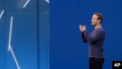 Facebook CEO Mark Zuckerberg makes the keynote address at F8, Facebook's developer conference, Tuesday, May 1, 2018, in San Jose, Calif. (AP Photo/Marcio Jose Sanchez)