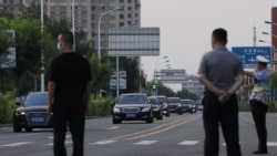 A group of vehicles arrives to a hotel where U.S. Deputy Secretary of State Wendy Sherman met with Chinese officials, in Tianjin, China July 25, 2021. (REUTERS/Tingshu Wang)