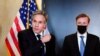 FILE - Secretary of State Antony Blinken, accompanied by national security adviser Jake Sullivan, talks to the media after a closed-door morning session of U.S.-China talks in Anchorage, Alaska, March 19, 2021.