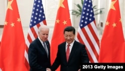 Disemba. 4, 2013, Rais wa China Xi Jinping, kulia, alipokutana na Makamu wa Rais wa Marekani Joe Biden Beijing.