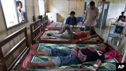 This 2009 photo shows malaria patients being treated at the hospital in Cambodia. (AP Photo/David Longstreath)