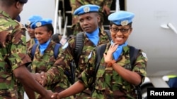 Kenya Defense Forces (KDF) soldiers, the first batch of the troops who had served in the U.N. peacekeeping mission in South Sudan, arrive at the Jomo Kenyatta international airport in Nairobi, Kenya, Nov. 9, 2016. 