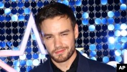 ARCHIVO - El cantante Liam Payne posa para los fotógrafos a su llegada a la Global Gift Gala en Londres, el 7 de marzo de 2019.