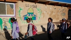 A mannequin depicting Superman is placed upside down next to the door of the parliament session hall hosting a no confidence vote agains Romanian Prime Minister Florin Citu's government in Bucharest, Romania.