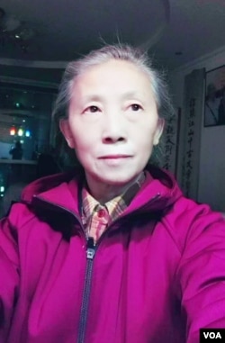 要求北京市政府公开雷洋案和解协议内容的北京市民谢小玲。（资料照片）