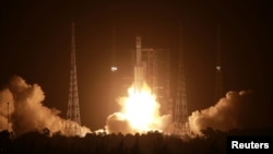 The Long March-7 Y3 rocket carrying the automated cargo resupply spacecraft Tianzhou-2 as one of the missions to complete China's space station, takes off from Wenchang Space Launch Center in Hainan province, China May 29, 2021. (China Daily via REUTERS)