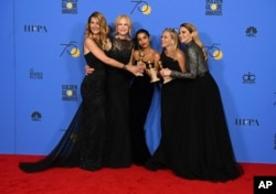 Laura Dern, from left, Nicole Kidman, Zoe Kravitz, Reese Witherspoon and Shailene Woodley in the press room with the award for best television limited series or motion picture made for television for 'Big Little Lies' at the 75th Golden Globe Awards.