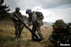 South Korean marines take part in a U.S.-South Korea joint landing operation drill as a part of the two countries' annual military training called Foal Eagle, in Pohang, South Korea, April 2, 2017.