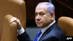 ARCHIVO - El primer ministro de Israel, Benjamin Netanyahu, asiste a ceremonia oficial el 13 de junio de 2021.
