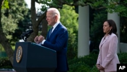 President Joe Biden speaks before signing a bill that awards Congressional gold medals to law enforcement officers that protected members on Congress at the Capitol during the Jan. 6 riots, in the Rose Garden of the White House, Aug. 5, 2021, in Washington.