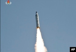 An image made from video of a news bulletin aired by North Korea's KRT on May 22, 2017, shows what was said to be the test-launch of a Pukguksong-2 missile at an undisclosed location in North Korea.