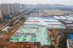 An aerial view shows the newly completed Huoshenshan Hospital, a dedicated hospital built in 8 days to treat coronavirus patients, in Wuhan, Hubei province, China February 2, 2020. China Daily via REUTERS