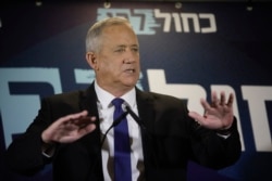 FILE - Blue and White party leader Benny Gantz delivers a statement in Tel Aviv, Israel, Sept. 19, 2019.