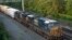 FILE - A CSX freight train travels through Alexandria, Virginia, on Sept. 15, 2022.