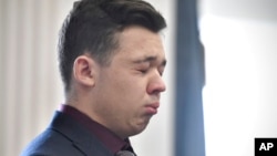 Kyle Rittenhouse closes his eyes and cries as he is found not guilty on all counts at the Kenosha County Courthouse in Kenosha, Wisconsin. (Sean Krajacic/The Kenosha News via AP, Pool)
