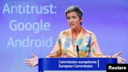 European Competition Commissioner Margrethe Vestager addresses a news conference on Google in Brussels, Belgium, July 18, 2018. 