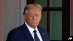 FILE - President Donald Trump is pictured at the White House in Washington, July 8, 2020.