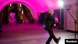 Bono sings during a performance for Ukrainian people inside a subway station in Kyiv