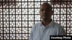 A boy approaches Pope Francis during the weekly general audience at the Vatican.