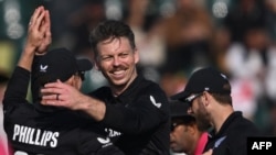New Zealand's Michael Bracewell (C) celebrates the wicket of Bangladesh's Mushfiqur Rahim (not pictured) during the ICC Champions Trophy one-day international (ODI) cricket match between Bangladesh and New Zealand at the Rawalpindi Cricket Stadium in Rawa