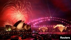 Празднование Нового года в Сиднее, Австралия (AAP Image/Bianca De Marchi/via Reuters). 