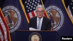 Fed Chair Powell holds news conference after the release of U.S. Fed interest rate policy decision in Washington.