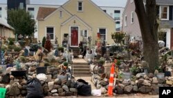 In this undated photo provided by the City of St. Paul, Minnesota, the front exterior of Iris Logan's home is pictured. (City of St. Paul, Minnesota via AP)