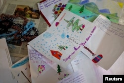 Letters addressed to Ioanna Matsouka are displayed in her house in Athens, Greece, March 6, 2024. (REUTERS/Karolina Tagaris)