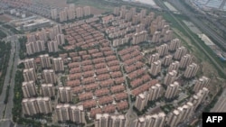 Foto dari udara tampak kompleks perumahan oleh perusahan properti China Fantasia Holdings Group di Tianjing, 5 Juni 2024. Krisis di sektor properti China masih berlangsung dan terus membebani pertumbuhan ekonomi negara itu. (Foto: Jade Gao/AFP)