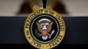 FILE - The seal of the president of the United States is seen affixed to a podium in the Roosevelt Room of the White House, in Washington, Sept. 4, 2019.
