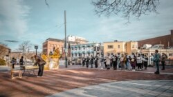Thai political activists hold an activity calling for abolishment of lese majeste law at King Bhumibol Adulyadej of Thailand Square in Boston, Massachusetts on December 5, 2021
