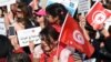 Des Tunisiennes lors d'une manifestation pour exiger une modification de la loi religieuse concernant l'héritage, à Tunis, le 10 mars 2018. 