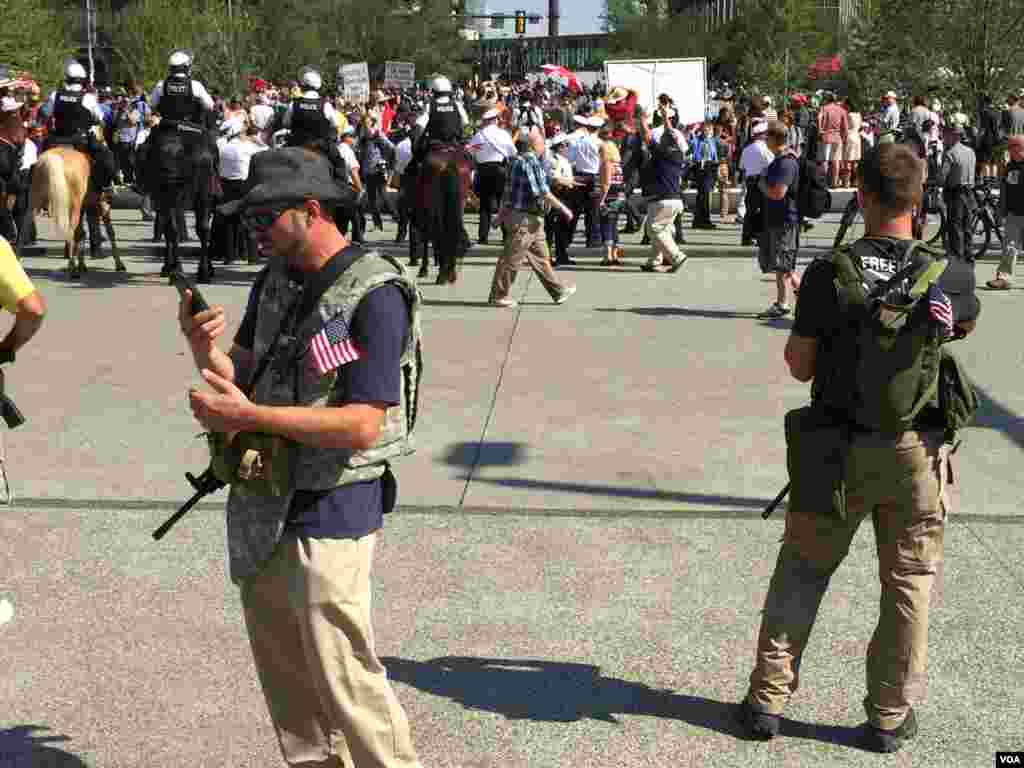 Protester is seen outside the convention hall in Cleveland, Ohio on July 19, 2016. (VOA/Mia Bush)