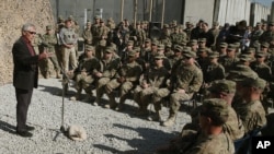 U.S. Defense Secretary Chuck Hagel speaks to American troops near Jalalabad during a visit to Afghanistan Dec. 7, 2014.